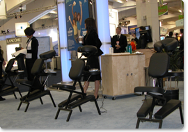 matching massage chairs shown in an exhibit